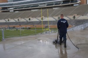 Commercial concrete cleaning of stadium floor